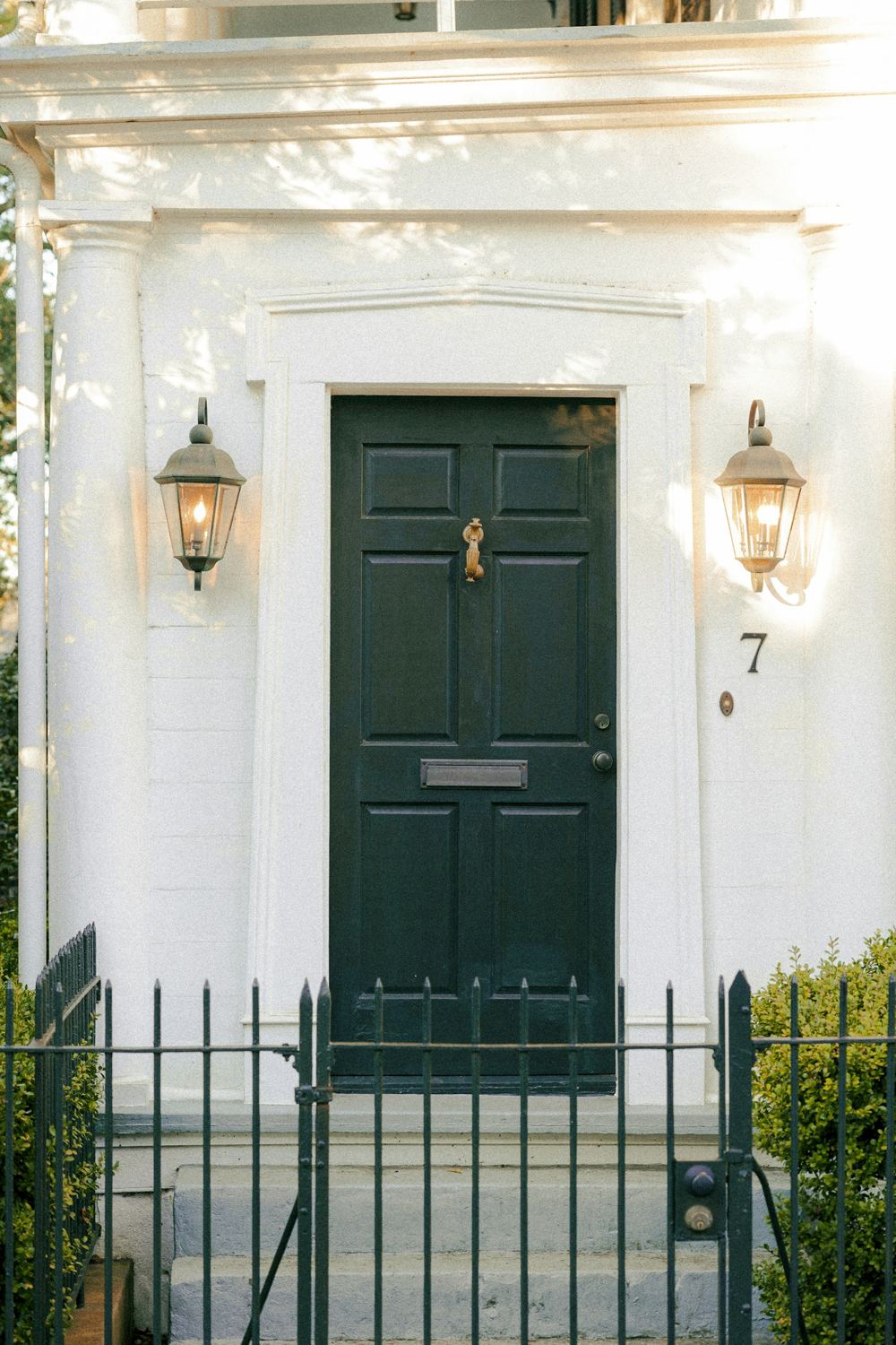 Charleston front door with lanterns